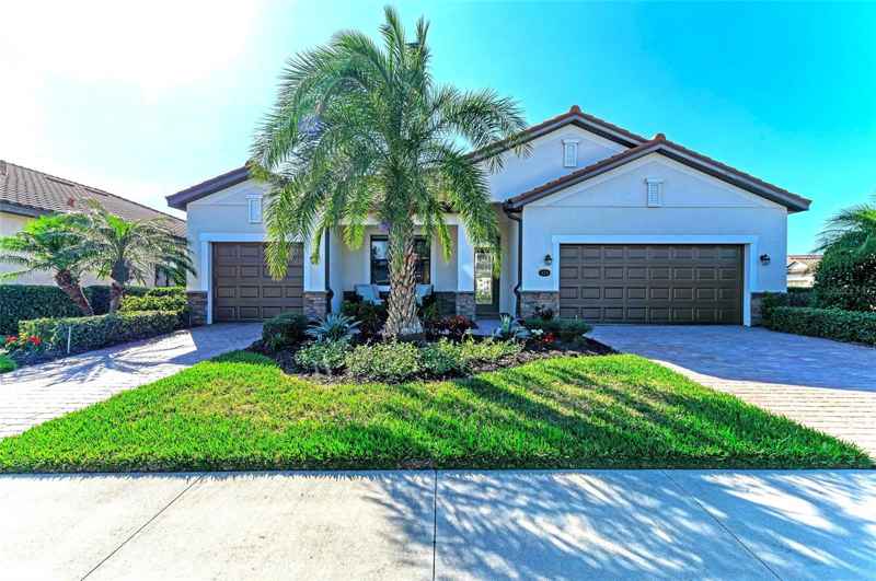 324 WHISPERING PALMS LN