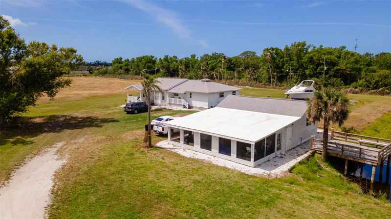 1727 E MANASOTA BEACH RD